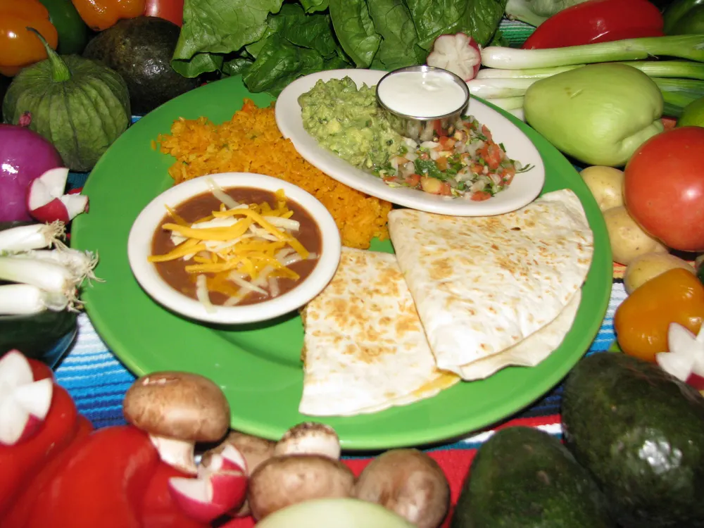 A quesadilla with rice and beans